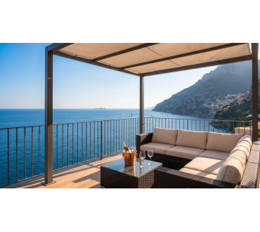 Terrazza panoramica privata con salotto da esterno vista mare e costa Appartamento Zaffiro