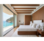 Camera da letto matrimoniale con vista mare panoramica e arredi moderni Appartamento Zaffiro